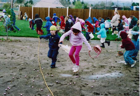 More than three hundred youngsters had no problem navigating the puddles to get the prizes.